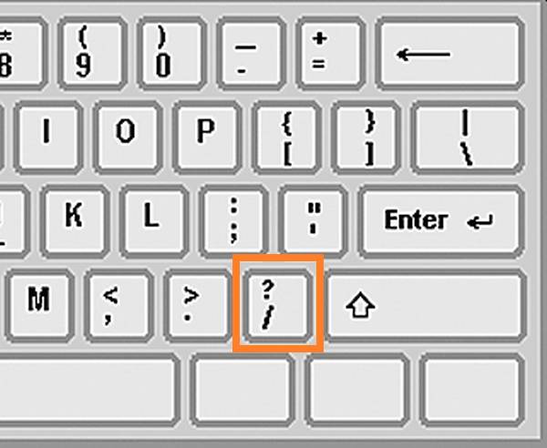 tecla slash en el teclado